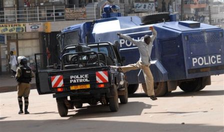 Ugandan police using force to keep opposition supporters out of sight of the Commonwealth summit. Nov 07.jpg